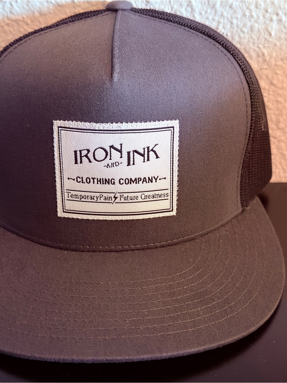 Men's Black Patch Trucker Hat. Iron & ink